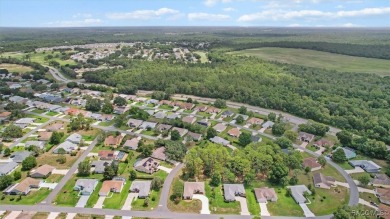 Discover the essence of Florida living in this beautifully on Twisted Oaks Golf Club in Florida - for sale on GolfHomes.com, golf home, golf lot