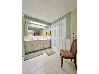 Nestled on a desirable corner lot in the serene back area of the on Fairway Village Golf Course in Florida - for sale on GolfHomes.com, golf home, golf lot