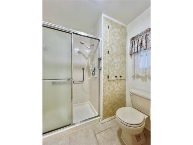 Nestled on a desirable corner lot in the serene back area of the on Fairway Village Golf Course in Florida - for sale on GolfHomes.com, golf home, golf lot