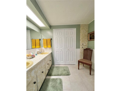 Nestled on a desirable corner lot in the serene back area of the on Fairway Village Golf Course in Florida - for sale on GolfHomes.com, golf home, golf lot