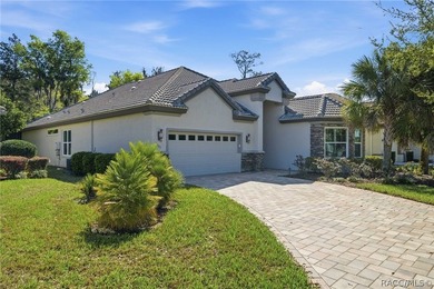 THIS GORGEOUS CUSTOM HOME welcomes you with an intricately on Skyview At Terra Vista Golf and Country Club in Florida - for sale on GolfHomes.com, golf home, golf lot