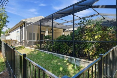 THIS GORGEOUS CUSTOM HOME welcomes you with an intricately on Skyview At Terra Vista Golf and Country Club in Florida - for sale on GolfHomes.com, golf home, golf lot