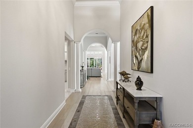 THIS GORGEOUS CUSTOM HOME welcomes you with an intricately on Skyview At Terra Vista Golf and Country Club in Florida - for sale on GolfHomes.com, golf home, golf lot