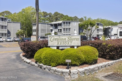 Welcome to this charming first-floor condo, ideally positioned on Carolina Shores Golf Course in North Carolina - for sale on GolfHomes.com, golf home, golf lot