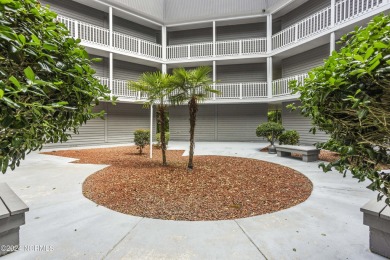 Welcome to this charming first-floor condo, ideally positioned on Carolina Shores Golf Course in North Carolina - for sale on GolfHomes.com, golf home, golf lot