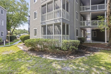 Welcome to this charming first-floor condo, ideally positioned on Carolina Shores Golf Course in North Carolina - for sale on GolfHomes.com, golf home, golf lot