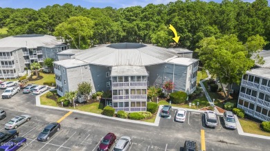 Welcome to this charming first-floor condo, ideally positioned on Carolina Shores Golf Course in North Carolina - for sale on GolfHomes.com, golf home, golf lot