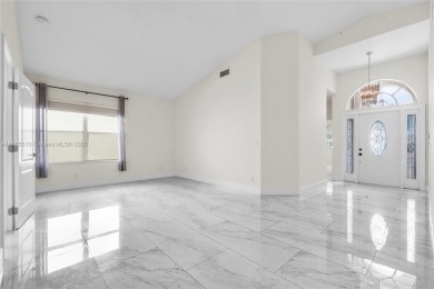 Beautiful 1-story single-family home in a gated Doral community! on Costa Greens Golf Club in Florida - for sale on GolfHomes.com, golf home, golf lot