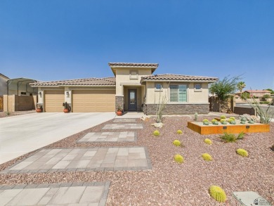 immaculate 2023 Elliott Home in Estrella at Mesa del Sol - on Mesa Del Sol Golf Club in Arizona - for sale on GolfHomes.com, golf home, golf lot