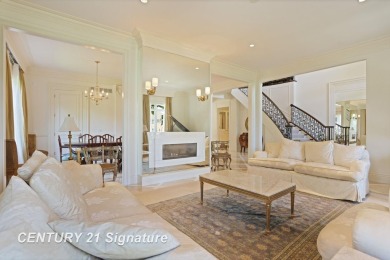 Luxurious 7-Bedroom Home on the 9th Hole of Apple Mountain Golf on Golf Club At Apple Mountain in Michigan - for sale on GolfHomes.com, golf home, golf lot