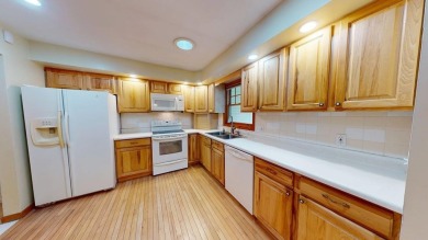 Custom Home Adjacent to Tamarack Golf Course -- Ideal for the on The Tamaracks in Michigan - for sale on GolfHomes.com, golf home, golf lot