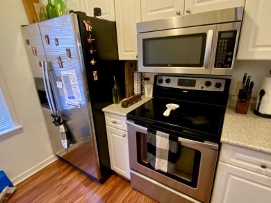 Spacious 2 bedrooms, 2 1/2 bath condo right in the main street on Celebration Golf Club in Florida - for sale on GolfHomes.com, golf home, golf lot