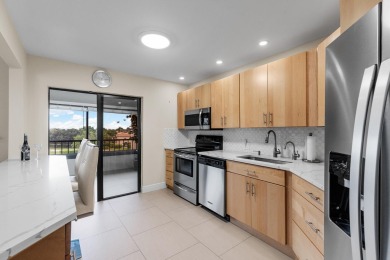 Beautifully updated and impeccably maintained, this clean and on Boca Pointe Country Club in Florida - for sale on GolfHomes.com, golf home, golf lot