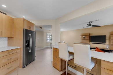 Beautifully updated and impeccably maintained, this clean and on Boca Pointe Country Club in Florida - for sale on GolfHomes.com, golf home, golf lot