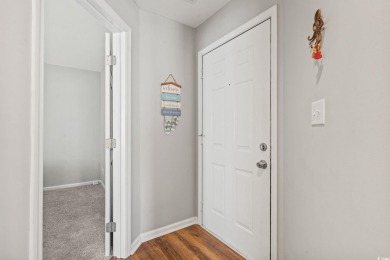 This light-filled 1-bedroom, 1.5-bath end-unit condo is nestled on Possum Trot Golf Course in South Carolina - for sale on GolfHomes.com, golf home, golf lot