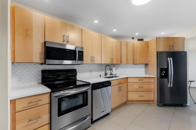 Beautifully updated and impeccably maintained, this clean and on Boca Pointe Country Club in Florida - for sale on GolfHomes.com, golf home, golf lot