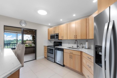 Beautifully updated and impeccably maintained, this clean and on Boca Pointe Country Club in Florida - for sale on GolfHomes.com, golf home, golf lot