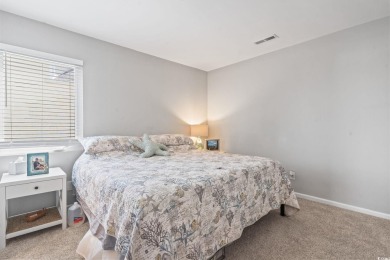 This light-filled 1-bedroom, 1.5-bath end-unit condo is nestled on Possum Trot Golf Course in South Carolina - for sale on GolfHomes.com, golf home, golf lot