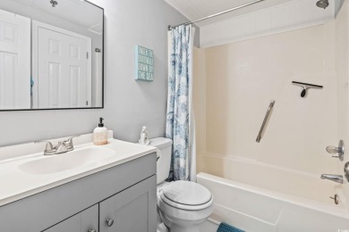 This light-filled 1-bedroom, 1.5-bath end-unit condo is nestled on Possum Trot Golf Course in South Carolina - for sale on GolfHomes.com, golf home, golf lot