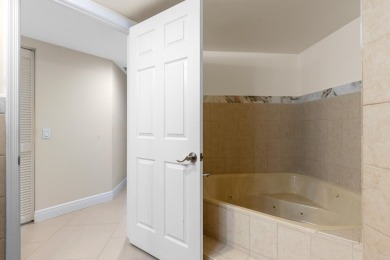 Beautifully updated and impeccably maintained, this clean and on Boca Pointe Country Club in Florida - for sale on GolfHomes.com, golf home, golf lot