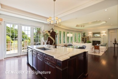 Luxurious 7-Bedroom Home on the 9th Hole of Apple Mountain Golf on Golf Club At Apple Mountain in Michigan - for sale on GolfHomes.com, golf home, golf lot
