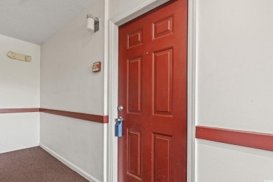 This light-filled 1-bedroom, 1.5-bath end-unit condo is nestled on Possum Trot Golf Course in South Carolina - for sale on GolfHomes.com, golf home, golf lot
