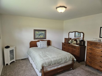 GOLF COURSE CONDO- Perfect for golf enthusiasts or anyone who on Lakeview Hills Country Club and Resort  in Michigan - for sale on GolfHomes.com, golf home, golf lot