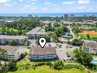 This light-filled 1-bedroom, 1.5-bath end-unit condo is nestled on Possum Trot Golf Course in South Carolina - for sale on GolfHomes.com, golf home, golf lot