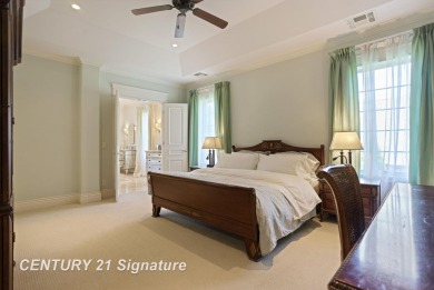 Luxurious 7-Bedroom Home on the 9th Hole of Apple Mountain Golf on Golf Club At Apple Mountain in Michigan - for sale on GolfHomes.com, golf home, golf lot