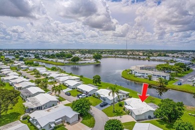Super Large Waterfront Lot with Wide Canal Views! Enjoy fishing on Leisureville Community Golf Course in Florida - for sale on GolfHomes.com, golf home, golf lot