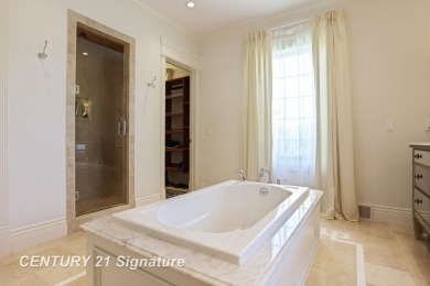 Luxurious 7-Bedroom Home on the 9th Hole of Apple Mountain Golf on Golf Club At Apple Mountain in Michigan - for sale on GolfHomes.com, golf home, golf lot