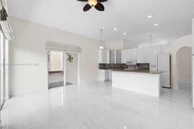Beautiful 1-story single-family home in a gated Doral community! on Costa Greens Golf Club in Florida - for sale on GolfHomes.com, golf home, golf lot