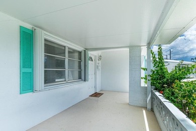 Super Large Waterfront Lot with Wide Canal Views! Enjoy fishing on Leisureville Community Golf Course in Florida - for sale on GolfHomes.com, golf home, golf lot