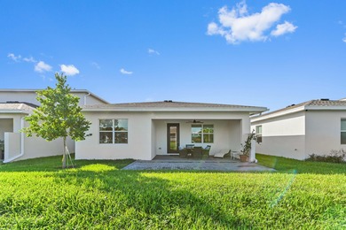 Beautiful new lakefront 3BR/2BA home in Delray Trails, Delray on Villa Del Ray Golf Club in Florida - for sale on GolfHomes.com, golf home, golf lot