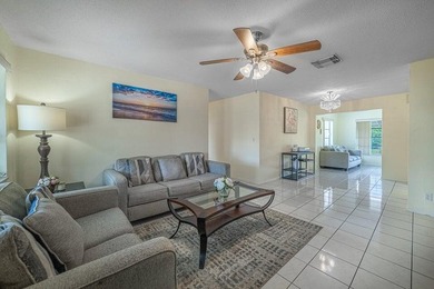 Super Large Waterfront Lot with Wide Canal Views! Enjoy fishing on Leisureville Community Golf Course in Florida - for sale on GolfHomes.com, golf home, golf lot