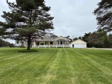 Custom Home Adjacent to Tamarack Golf Course -- Ideal for the on The Tamaracks in Michigan - for sale on GolfHomes.com, golf home, golf lot