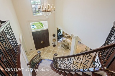 Luxurious 7-Bedroom Home on the 9th Hole of Apple Mountain Golf on Golf Club At Apple Mountain in Michigan - for sale on GolfHomes.com, golf home, golf lot