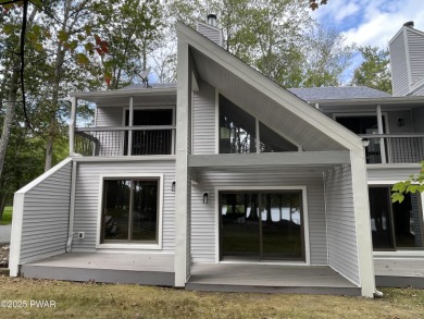Unbeatable location nestled directly between the tranquil shores on Paupack Hills Golf and Country Club in Pennsylvania - for sale on GolfHomes.com, golf home, golf lot