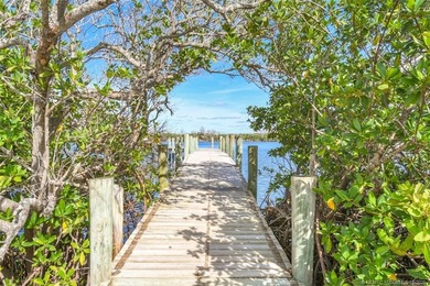 Enjoy stunning golf-course views from this updated on Miles Grant Country Club in Florida - for sale on GolfHomes.com, golf home, golf lot