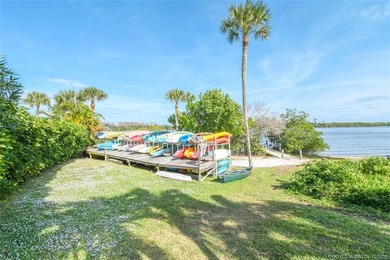 Enjoy stunning golf-course views from this updated on Miles Grant Country Club in Florida - for sale on GolfHomes.com, golf home, golf lot