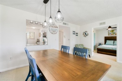 Enjoy stunning golf-course views from this updated on Miles Grant Country Club in Florida - for sale on GolfHomes.com, golf home, golf lot