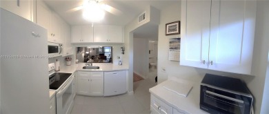 Enjoy the Ultimate Florida Experience. GOLF, swimming & on Sunrise Lakes Phase IV Golf Course in Florida - for sale on GolfHomes.com, golf home, golf lot