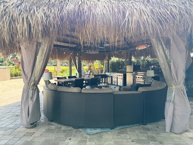 Beautiful, large pull in lot overlooks the rolling hills of the on St. Lucie Trail Golf Club in Florida - for sale on GolfHomes.com, golf home, golf lot