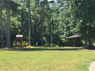 Welcome home to beautiful Woodlake Subdivision! This one-owner on Bear Creek Golf Club Inc in Georgia - for sale on GolfHomes.com, golf home, golf lot