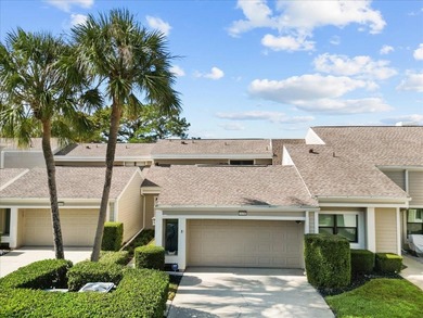 **Welcome Home** to this beautifully updated townhome on Countryside Country Club in Florida - for sale on GolfHomes.com, golf home, golf lot