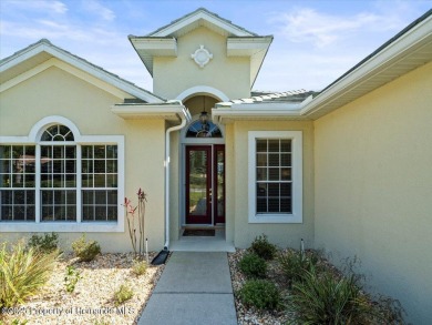 Beautiful 2004 Addison Sandhill Crane pool home situated on a on Glen Lakes Country Club in Florida - for sale on GolfHomes.com, golf home, golf lot