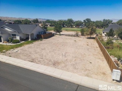 This lot backs a green on Desert Lakes Golf Course. All on The Golf Club of Fernley in Nevada - for sale on GolfHomes.com, golf home, golf lot