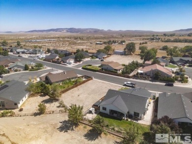 This lot backs a green on Desert Lakes Golf Course. All on The Golf Club of Fernley in Nevada - for sale on GolfHomes.com, golf home, golf lot