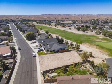 This lot backs a green on Desert Lakes Golf Course. All on The Golf Club of Fernley in Nevada - for sale on GolfHomes.com, golf home, golf lot