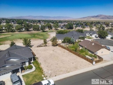 This lot backs a green on Desert Lakes Golf Course. All on The Golf Club of Fernley in Nevada - for sale on GolfHomes.com, golf home, golf lot